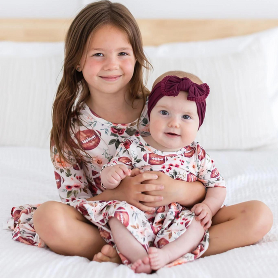 Footballs & Flowers Twirl Bodysuit